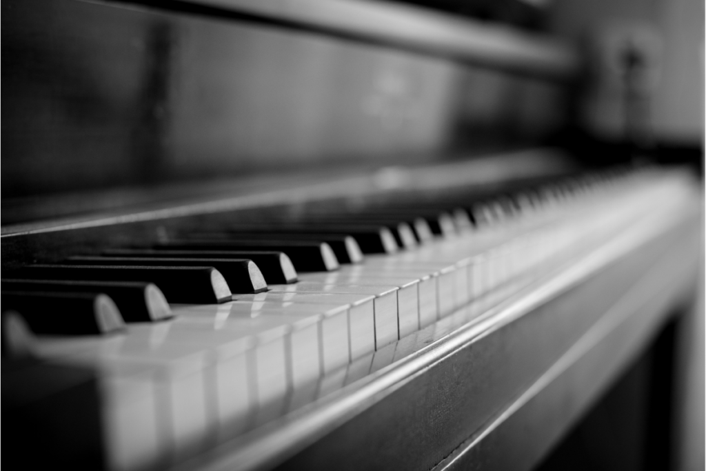 black and white shot of piano keys facts about pianos
