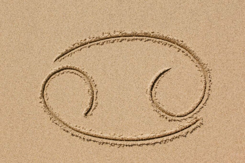 29 Interesting Facts About Cancer Women Most People Don't Know (2022) 4 cancer sign in sand