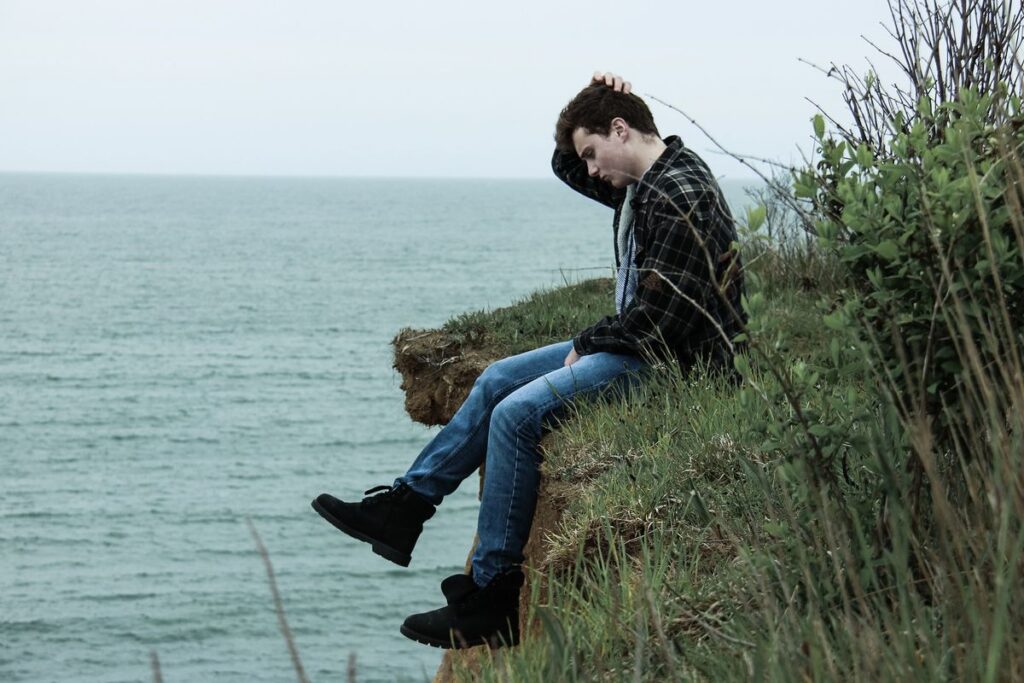 lonely-man-on-cliff