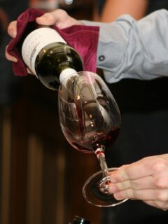 person-pouring-wine