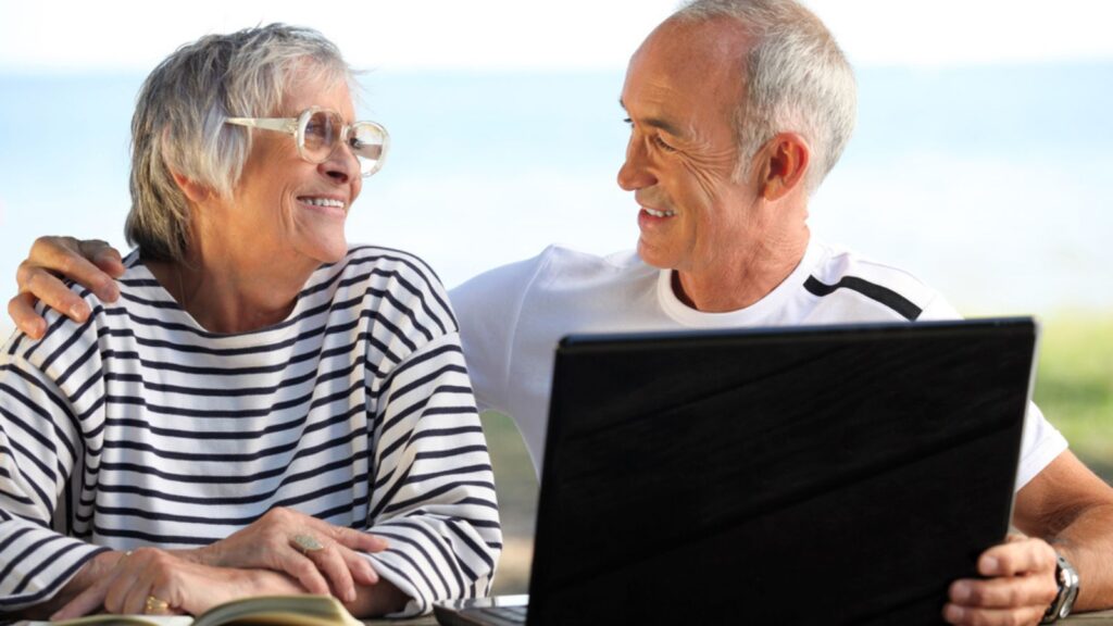 couple sitting at the computer