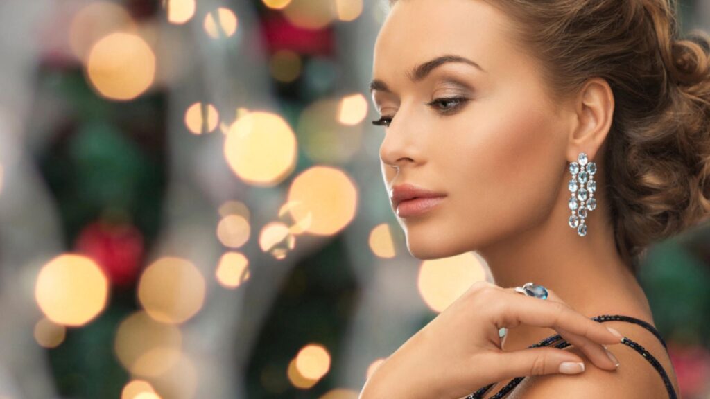 beautiful woman with diamond earrings rich