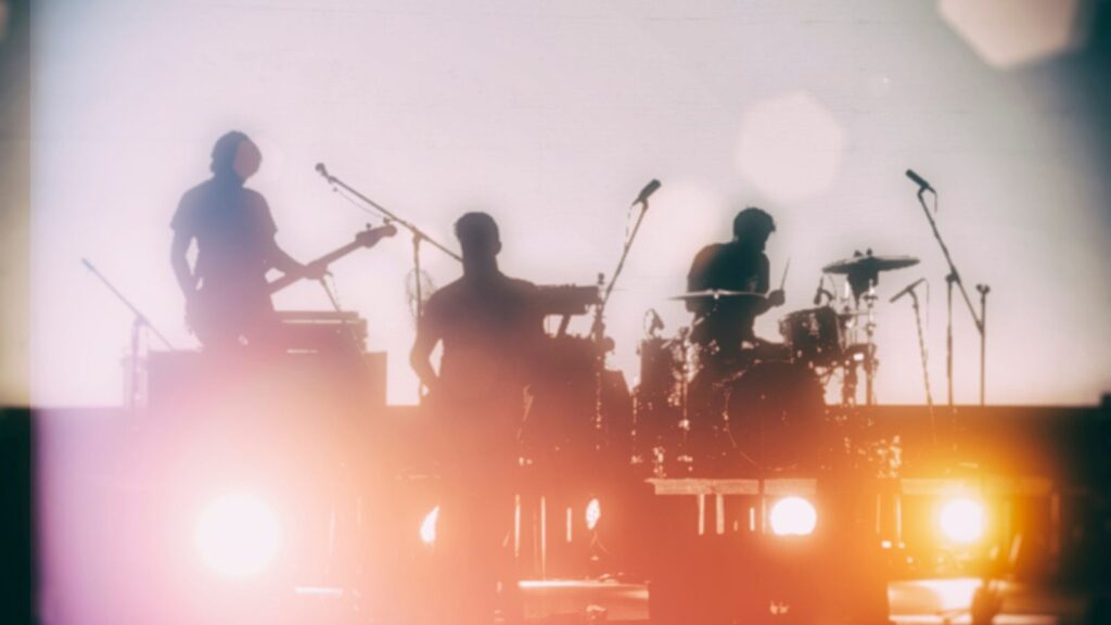 An Image from Old time's Music Festival, Musicians Playing Drums