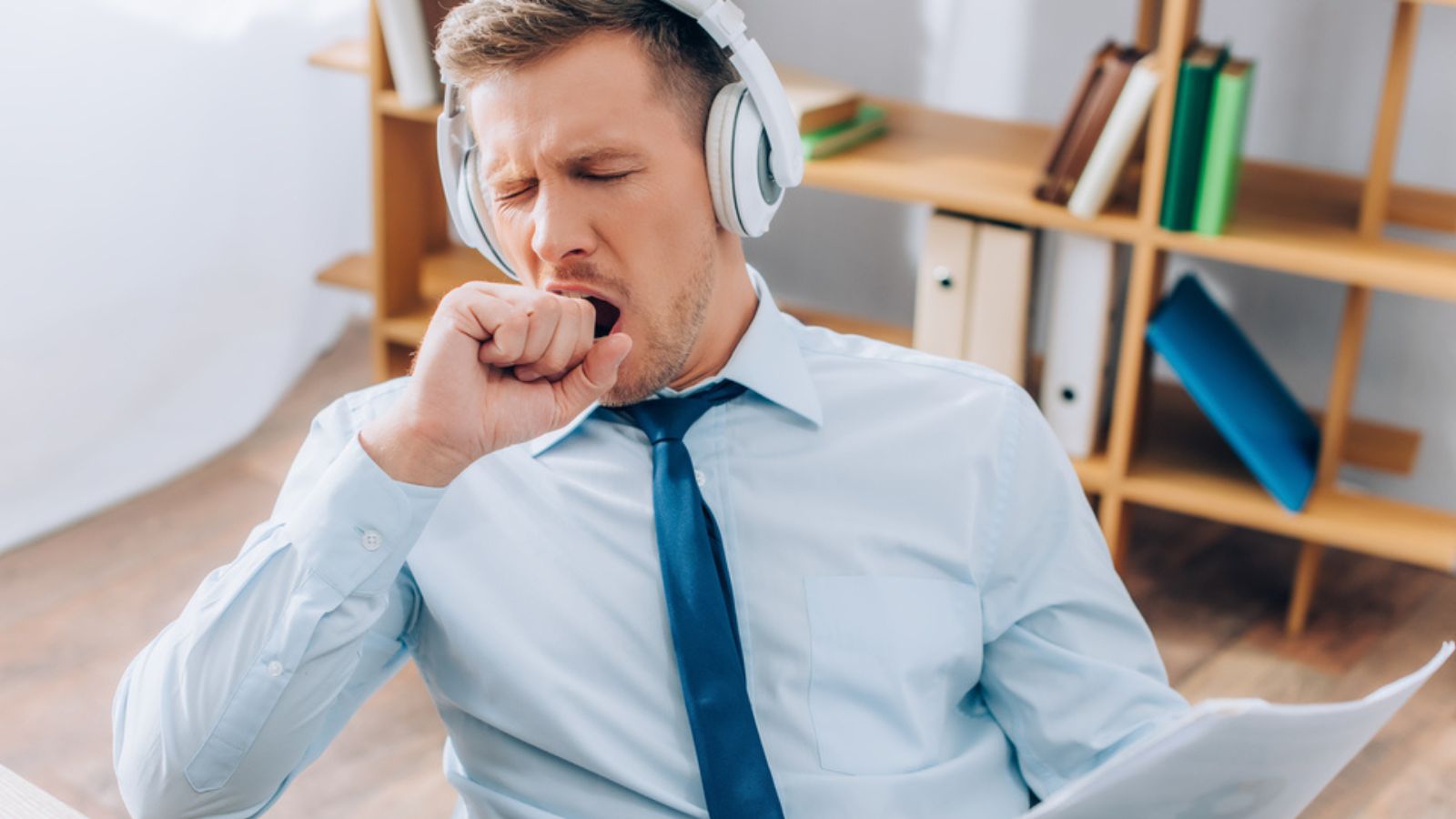 Employee yawning on the work