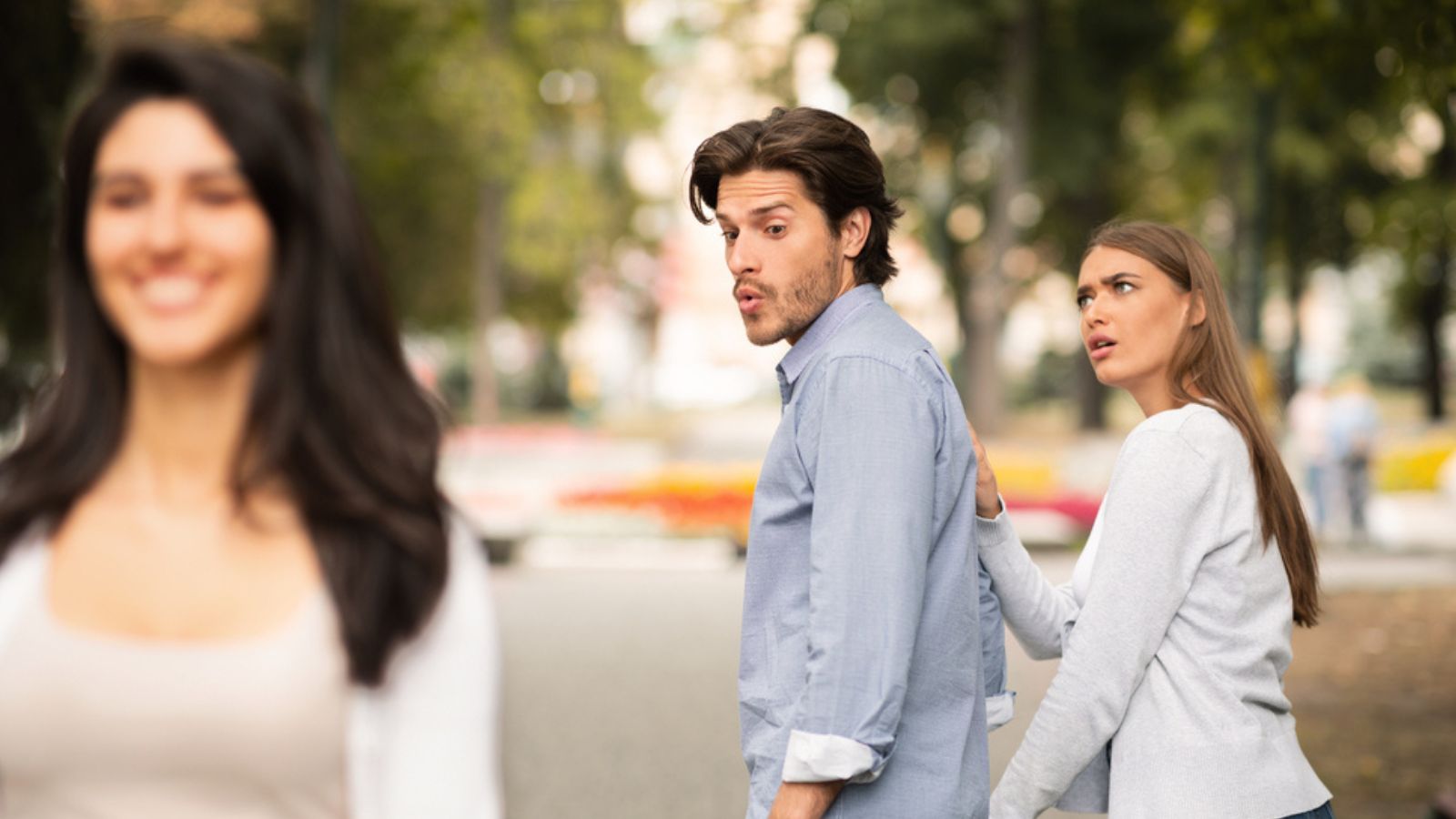 Jealous Girlfriend Calling Boyfriend Distracted By Other Attractive Woman