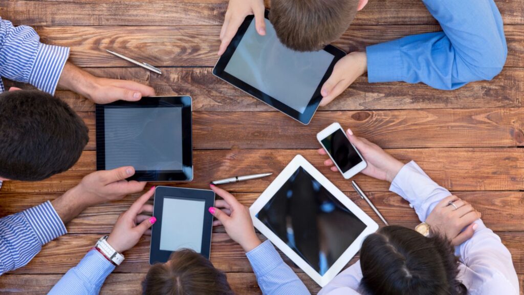 Man and woman using Gadgets