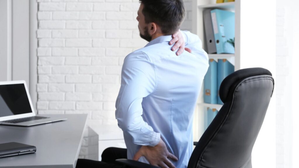 Man suffering from back pain