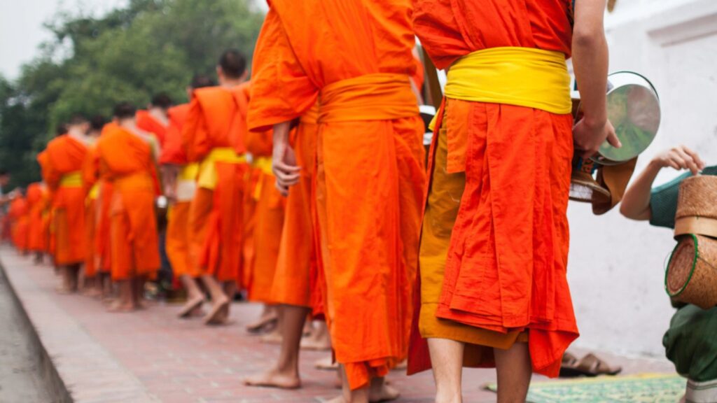 Mans wear Odd Cultural dress Buddhist monks in Lao