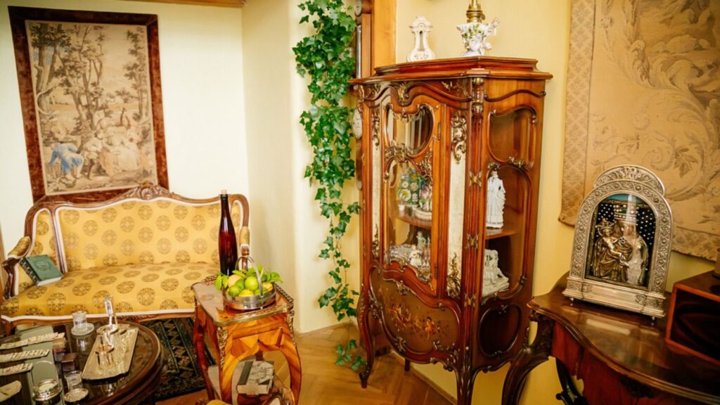 Radun castle interior, Neo-Classical chateau, yellow library, baroque and rococo carved wooden furniture