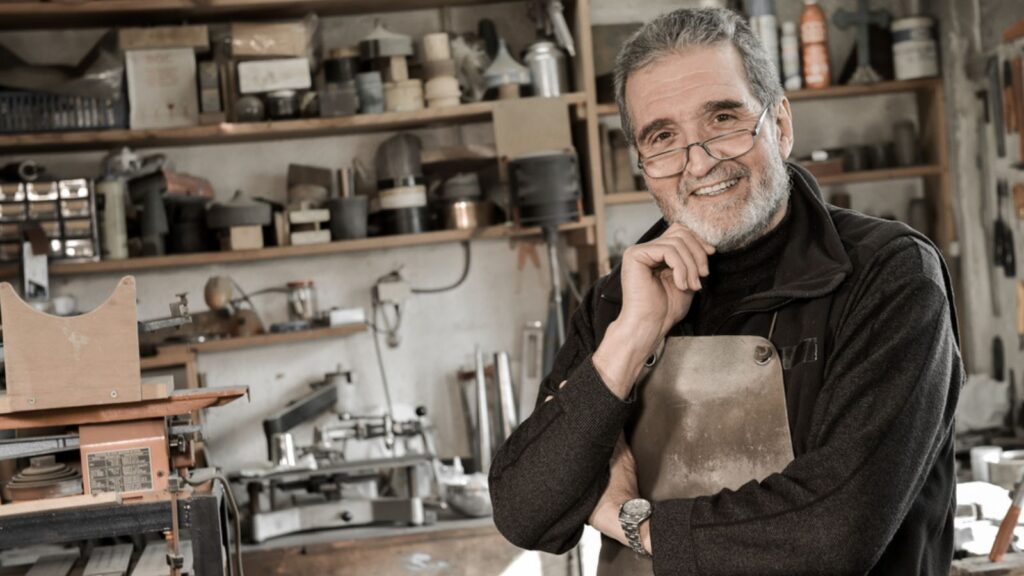Portrait Master goldsmith working in his workshop