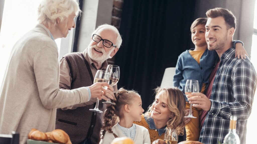 happy family dinner wine glass toast