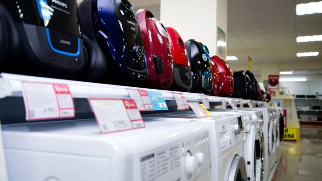 Household electrical appliances store CENTER . Shelving with goods 