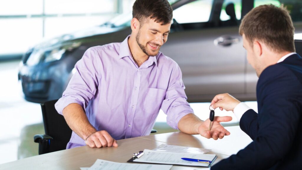 Man with car dealer