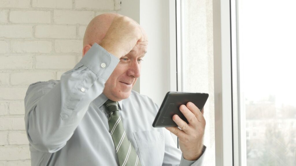 Old Businessman Use Electronic Tablet Read Good News and Make Victory