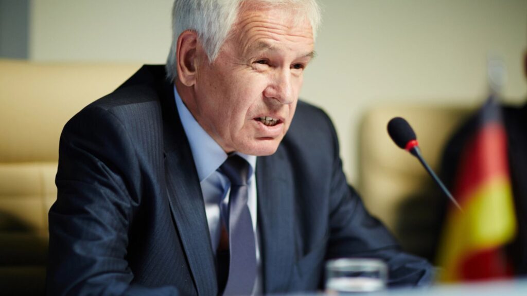 Political leader old man making report