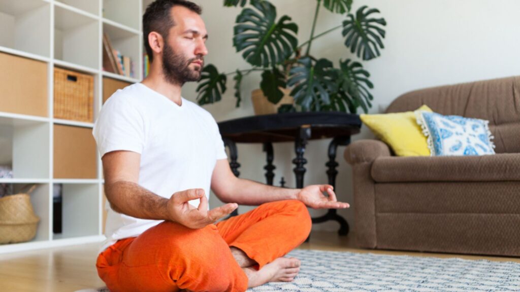 Man practicing yoga and meditation at home. A series of yoga pose