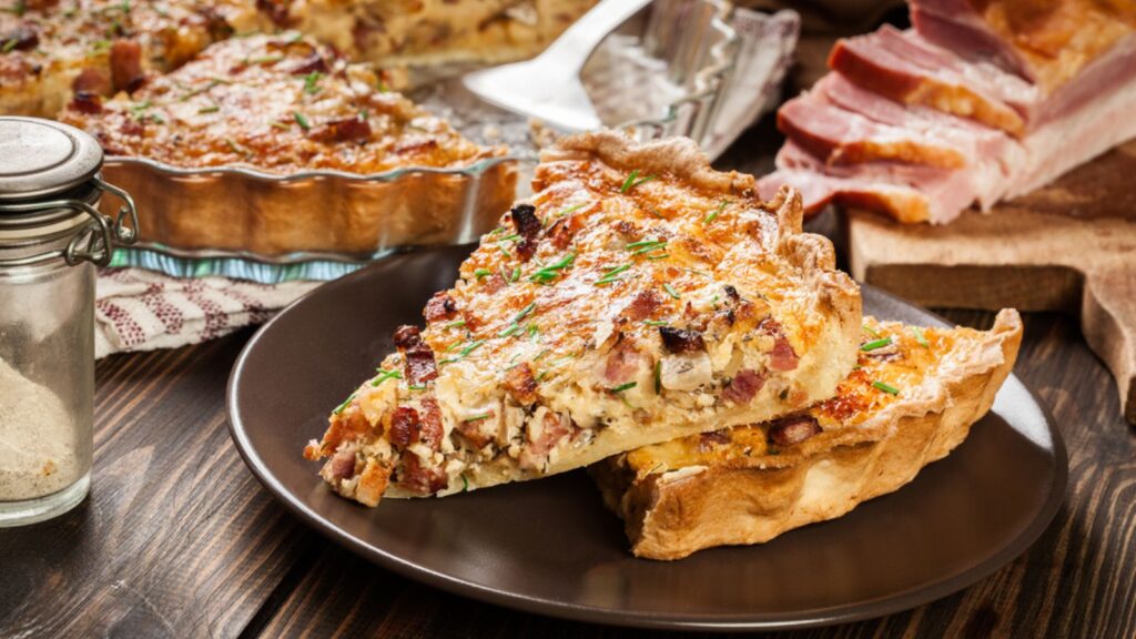 Pieces of quiche lorraine with bacon and cheese. French cuisine
