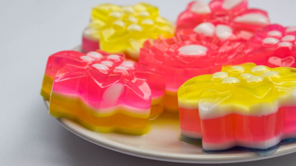 Rainbow jelly in flower shape Thai traditional dessert made from sugar, gelatin and coconut milk