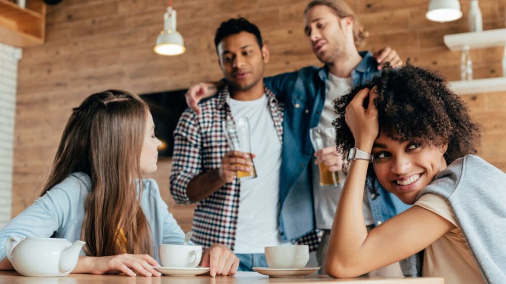 Shy woman to her new friends in a cafe