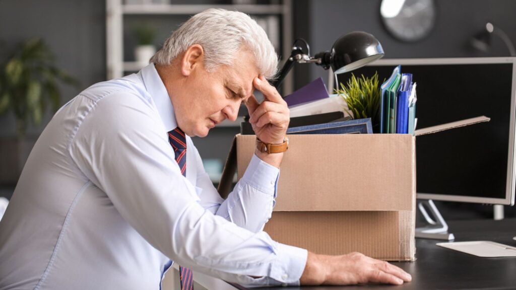 sad old professional working man fired stressed no money