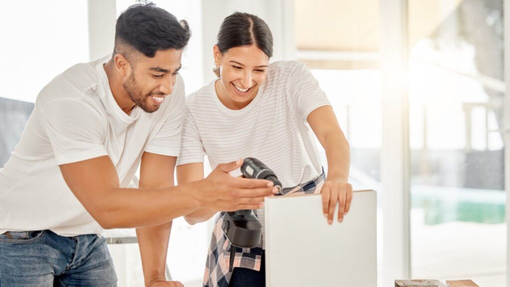young couple homeowners working on home renovation