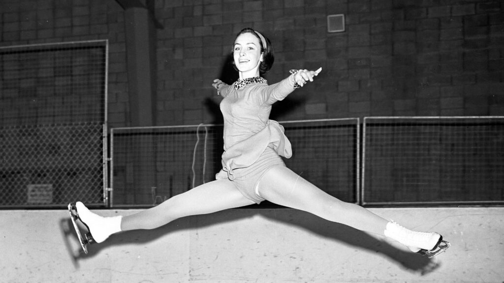 16 year-old ice skater Peggy Fleming practicing jump for national title at a rink in Pasadena, California