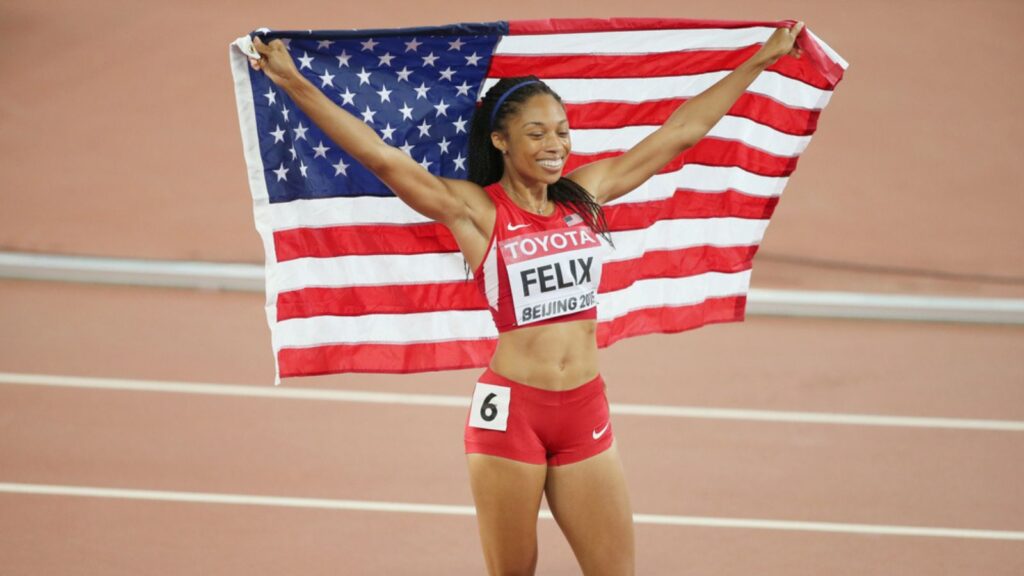 Allyson Felix of the United States celebrates after winning the women's 400m final during the Beijing 2015 IAAF World Championships at the National Stadium