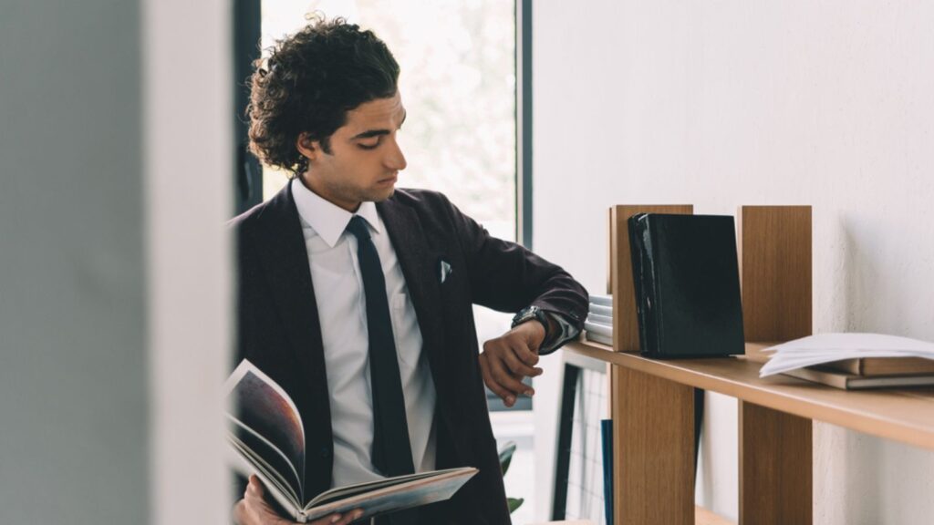 Businessman checking time