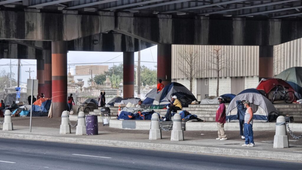 Homeless prepare to spend the night under a bridge, March 24, 2009 in New Orleans. 200 homeless live in the compound of tents and makeshift shelters.
