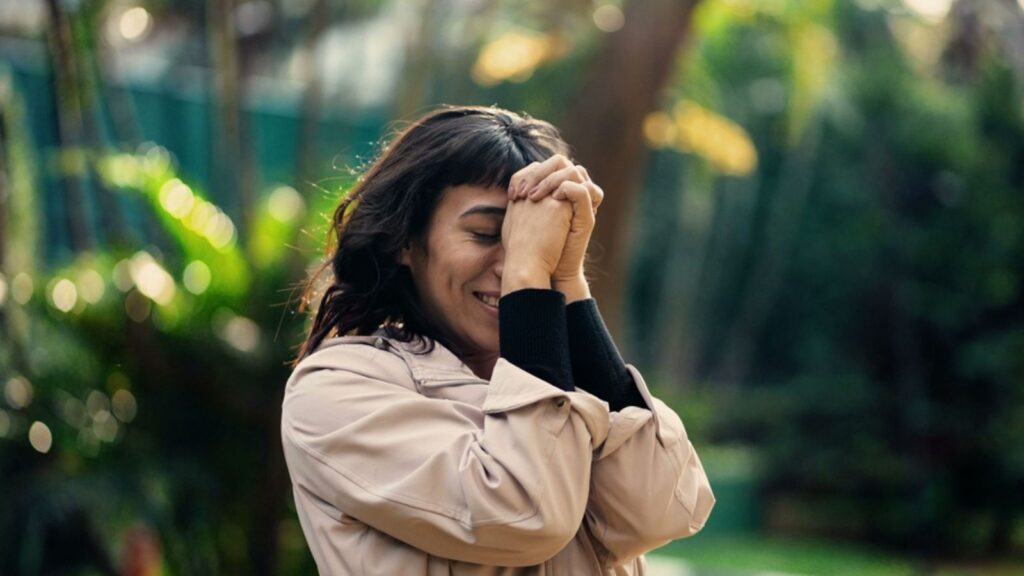 Woman praying being thankful