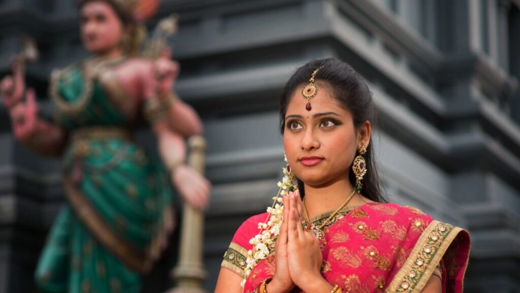 Young Indian woman praying