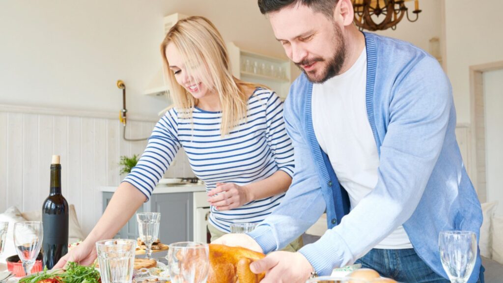 man and woman thanksgiving dinner host