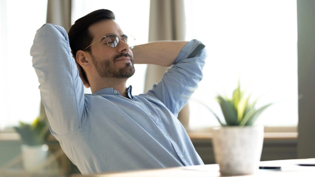 peaceful lazy relaxing man at work