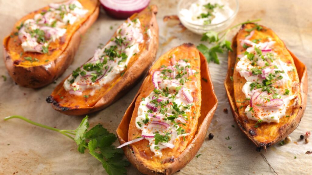 Baked sweet potato with cream and herbs