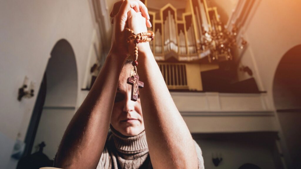 Christian woman praying in church