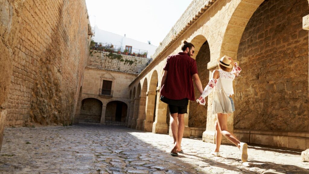 Couple walking on street during daytime, Colombia