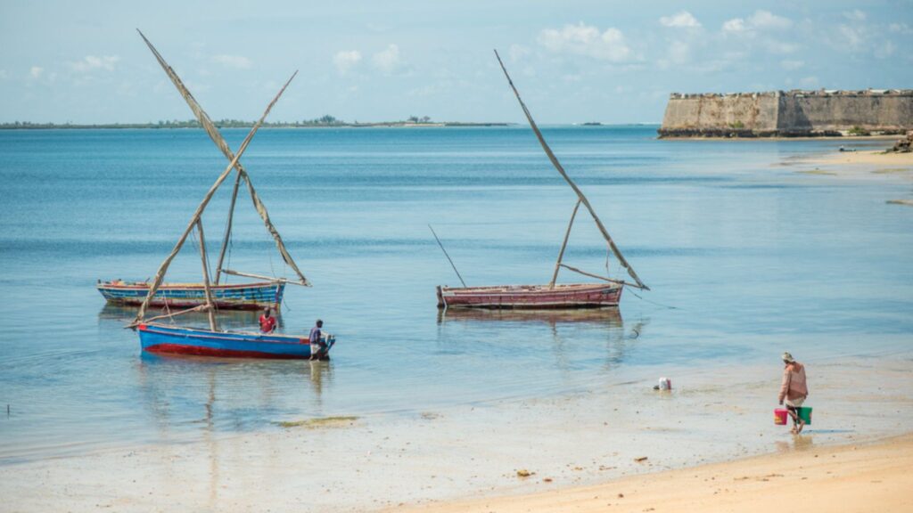 Fishing boats on the beach on a sunny day. Mozambique island or the Island of Mozambique, Ilha de Mozambique, Nampula Province, Africa