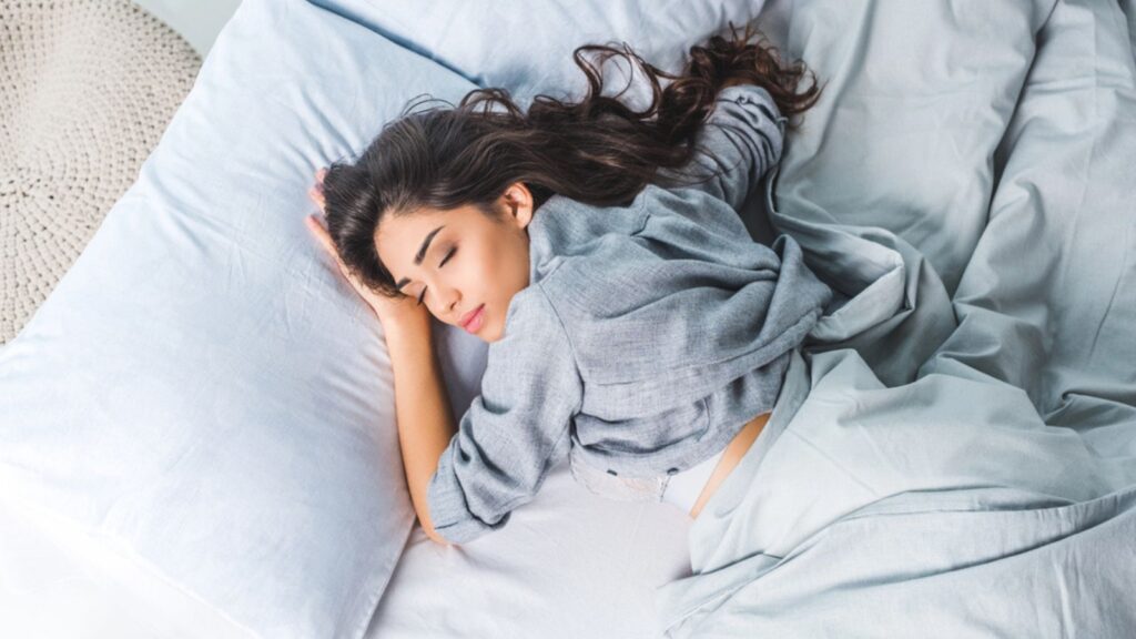 Girl sleeping in bed
