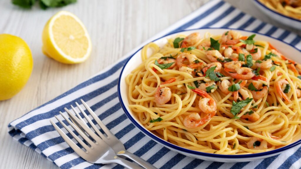 Homemade Garlic Shrimp Scampi with Parsley on a Plate, low angle view