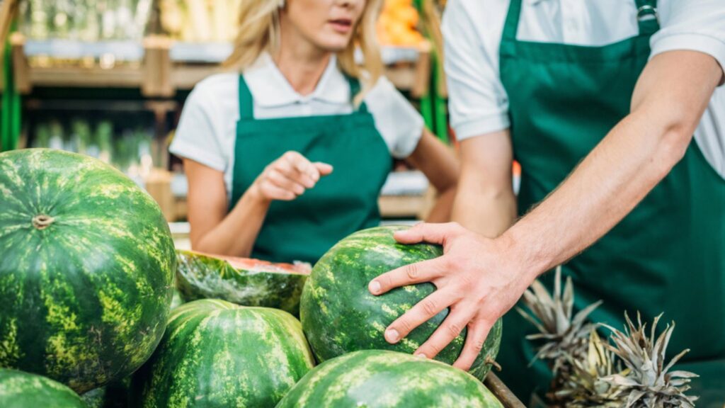Shop assistants in supermarket