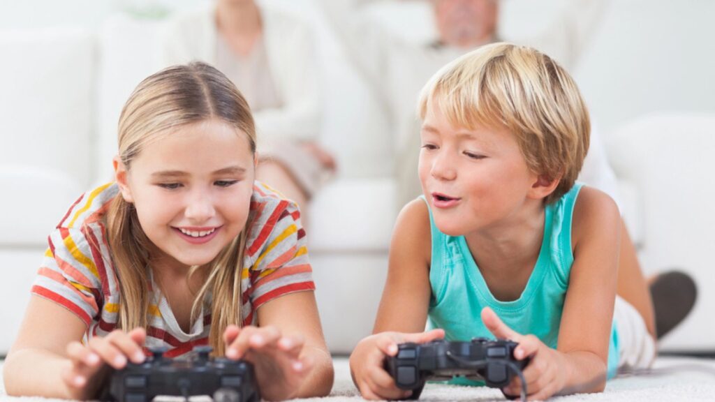 Siblings playing video games