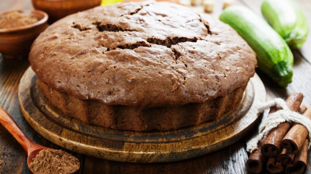 Zucchini cake with cocoa powder on the table