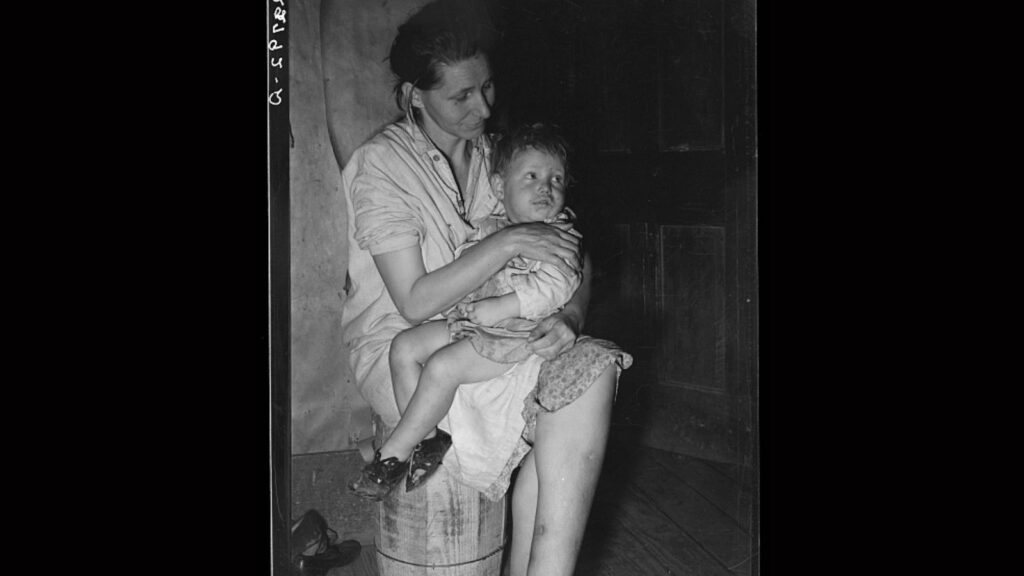 A mother with her son during the Great Depression