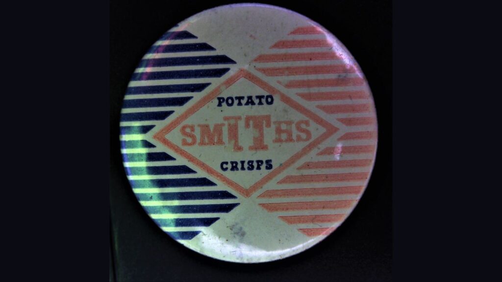 Advertising pin of an old (Dutch) product or brand