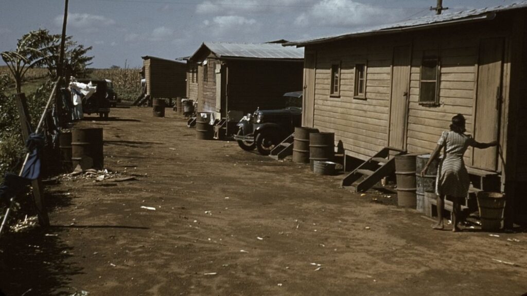 Houses which have been condemned by the Board of Health but are still occupied by Negro migratory workers, Belle Glade, Fla.