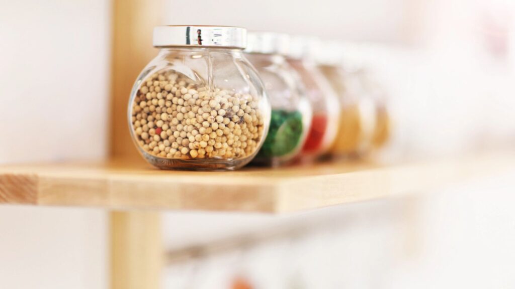 Jars with spices in the kitchen