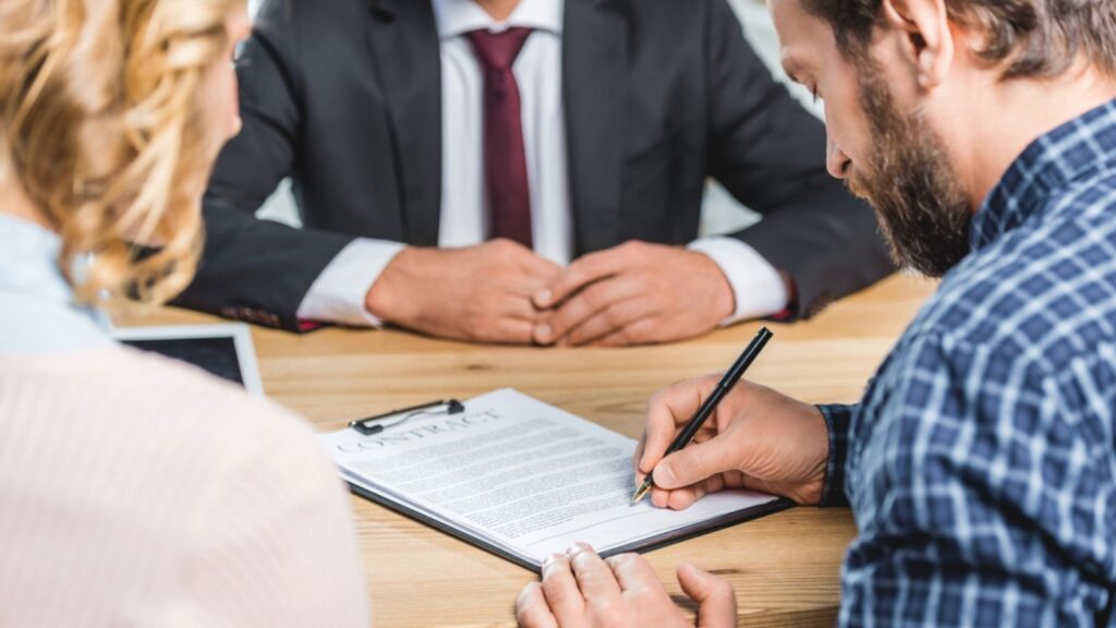 Man signing contract