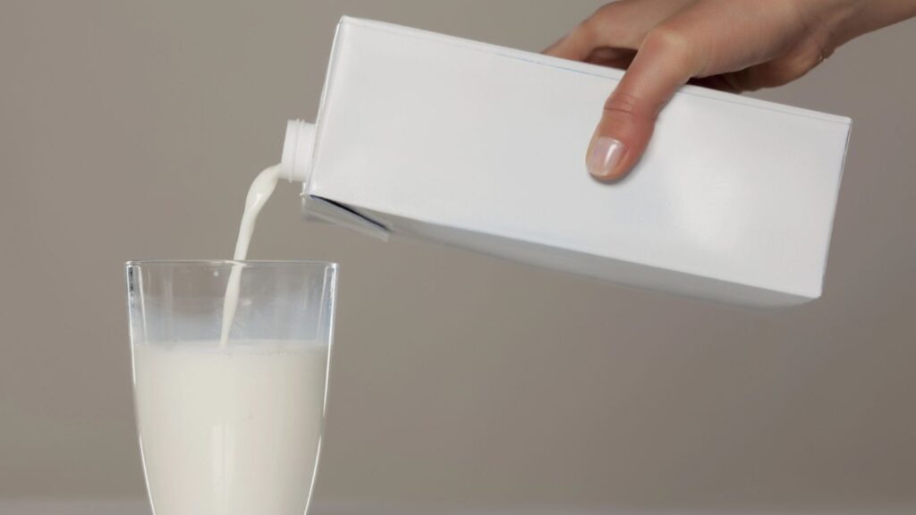 Milk pouring into a glass