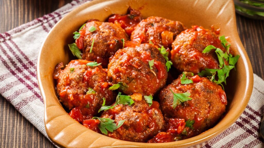 Pork meatballs with spicy tomato sauce in dish