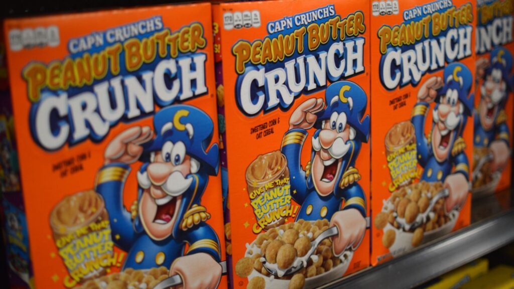 Columbus, Ohio-USA Cap'n Crunch Peanut Butter Crunch featured in the cereal aisle of a local supermarket.